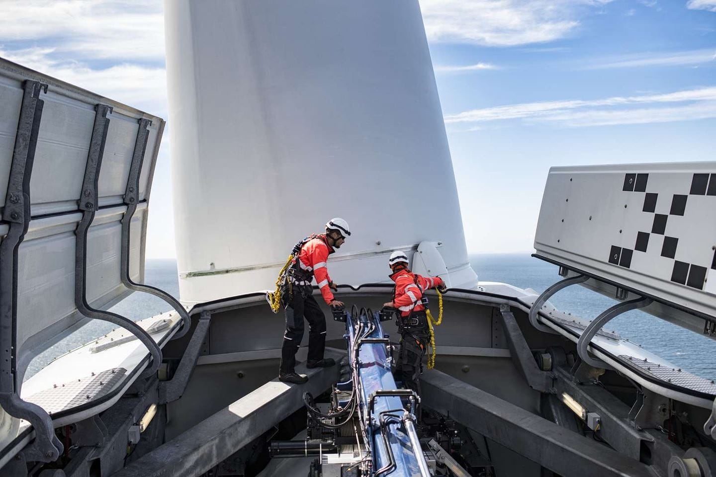 Technicians working on a turbine on Walney offshore wind farm