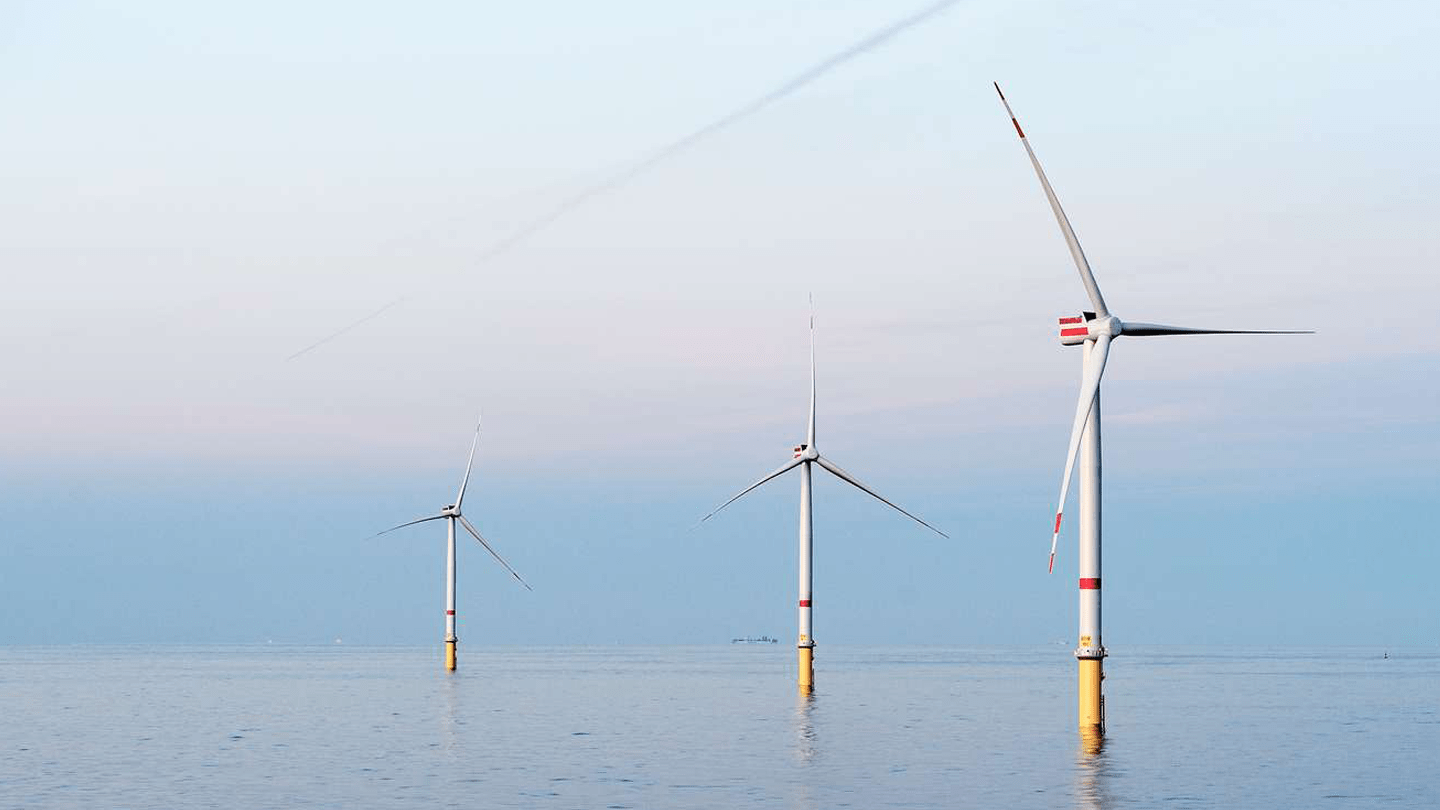 Three offshore wind turbines.