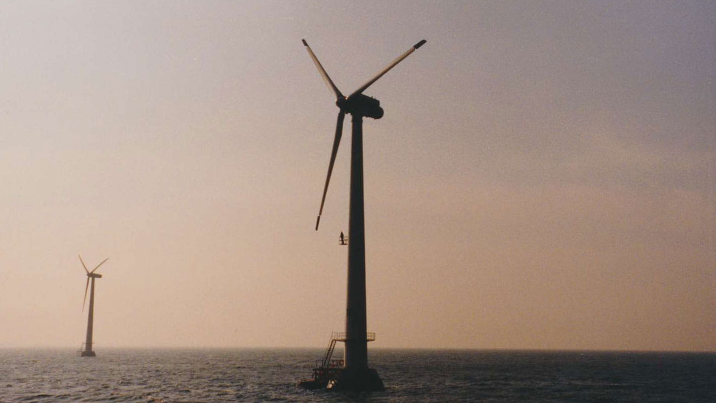 Two wind turbines at Vindeby Offshore Wind Farm.