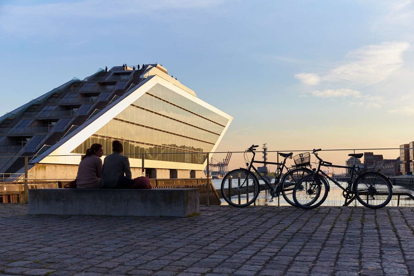 People sitting in front of Ørsted's German head office.