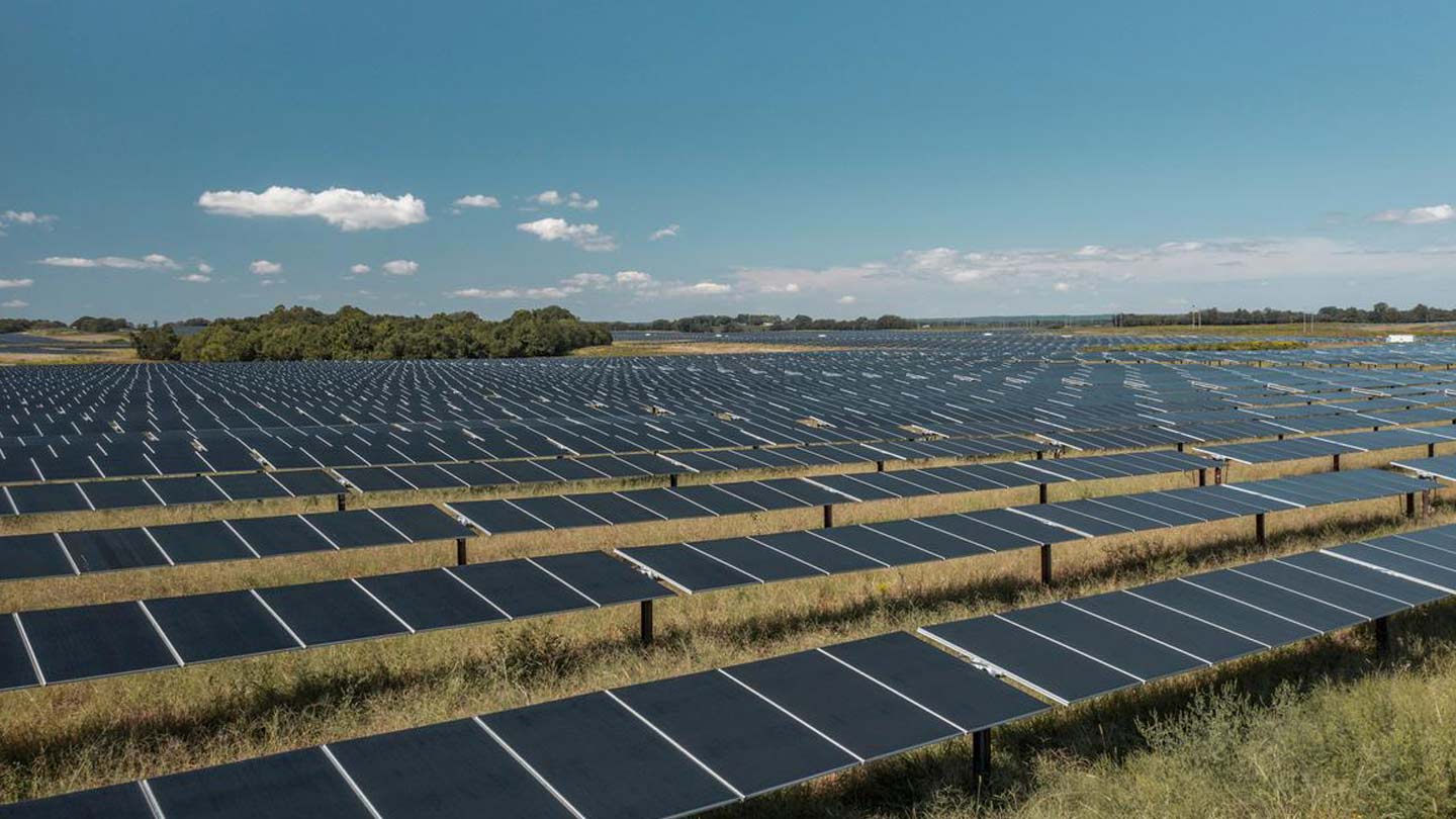 Rows of black solar panels at Ørsted's Muscle Shoals facility in Alabama, a project delivering clean energy to the U.S.