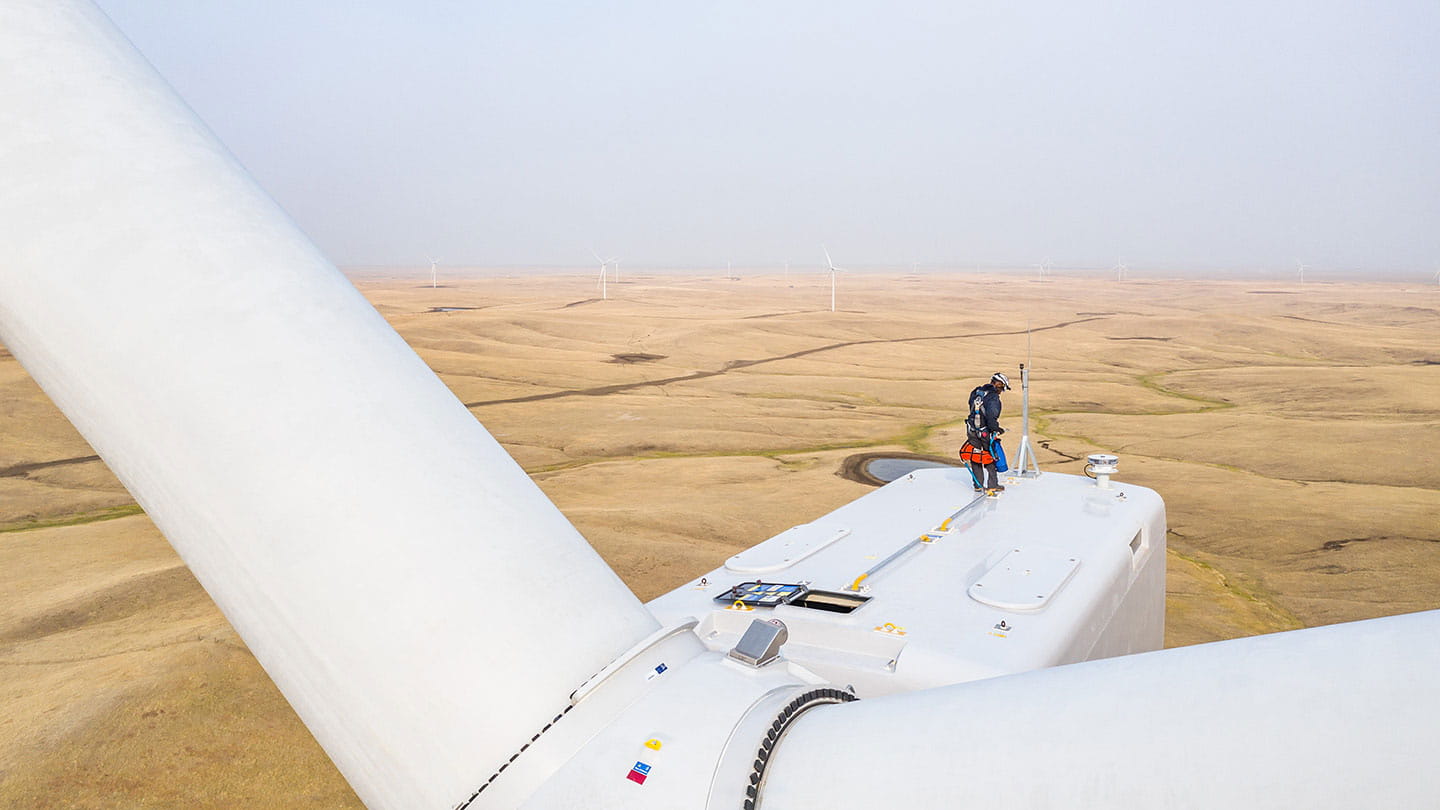 Ørsted employees working on onshore wind turbine